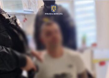 Un bărbat a fost reținut pentru că a tras cu arma de la fereastra locuinței sale din centrul municipiului Giurgiu